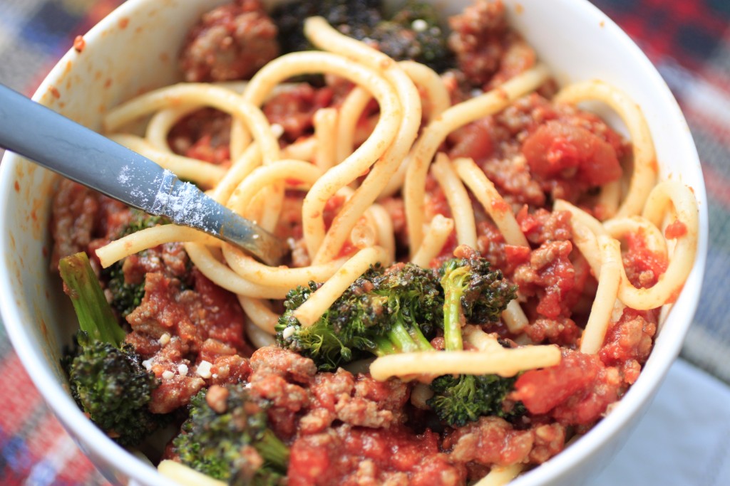 Bowl of roasted broccoli pasta with meat sauce
